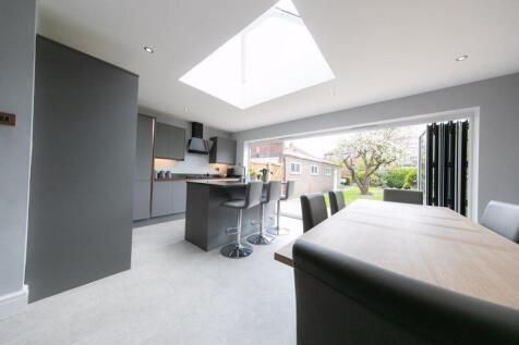 Dining area, kitchen &amp; bi-fold do...