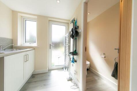 Utilities space and washroom
