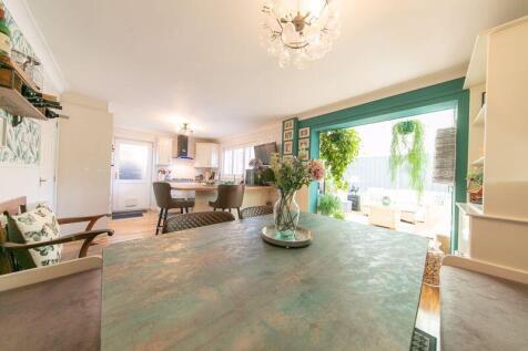 Kitchen, dining room and sun lounge