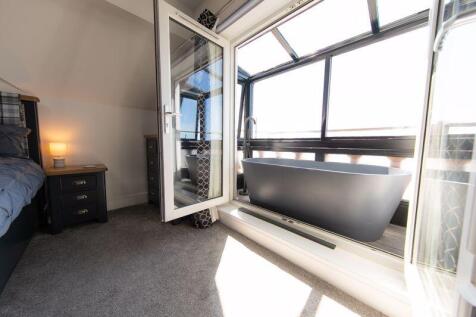 Bedroom 1 private balcony bathtub