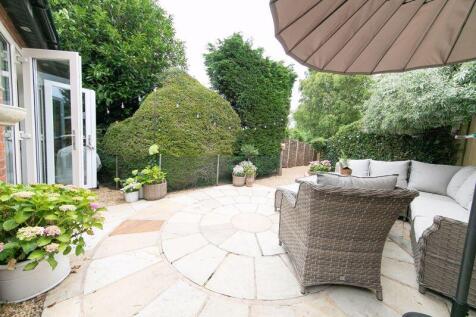 Private patio &amp; path to garden