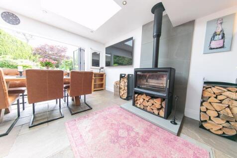 Feature log burning stove
