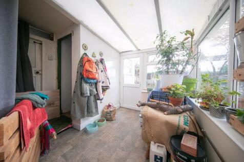 Rear porch and utilities space