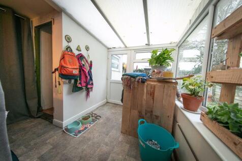 Utilities room and rear porch