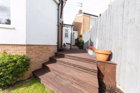 Decked patio and steps to garden
