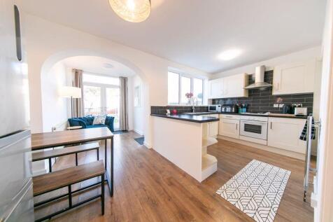 Dining room, kitchen and sun lounge