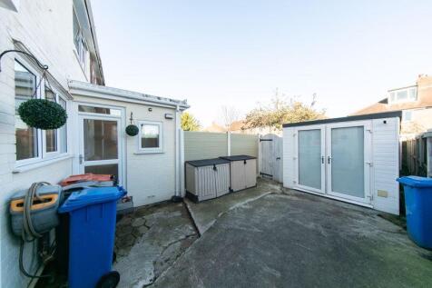 Converted garage and bin store area