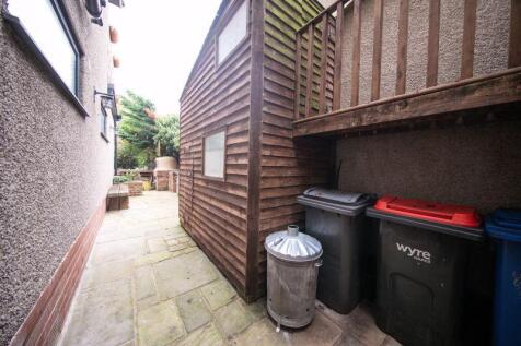 Two storey shed and bin store