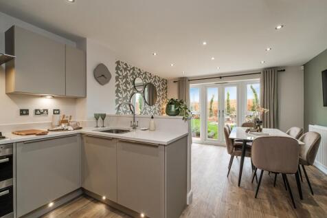 Interior view of the Kitchen, family &amp; dining space in our 3 bed Knightwood home