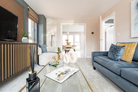 The living room opens up to the dining area