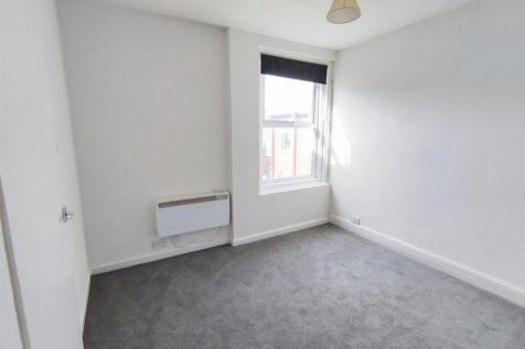 First flr flat 99 Nelson Road Central bedroom.jpg