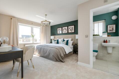 A generously sized bedroom 1
