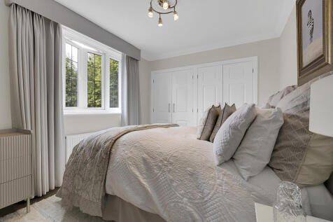 Guest bedroom with built in wardrobes