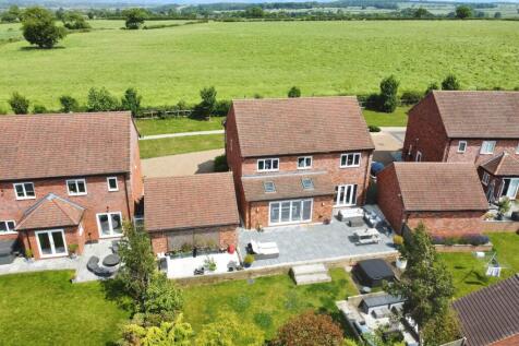 Ariel View of Rear of Property and Fields