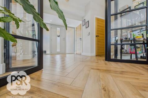 Sumptuous Herringbone Floored Hallway