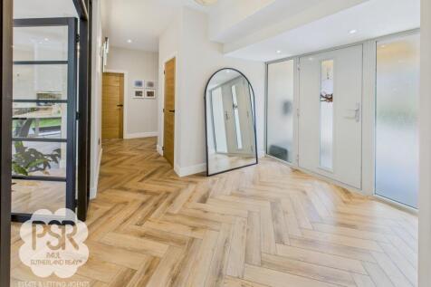 Herringbone Floored Main Hallway