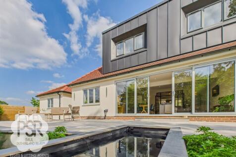 Elegant Porcelain Patio and Pond