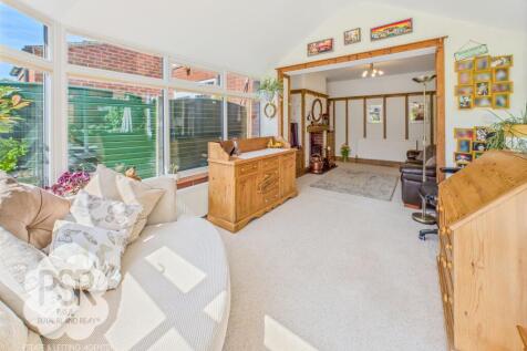 Open-Plan Conservatory and Sitting Room
