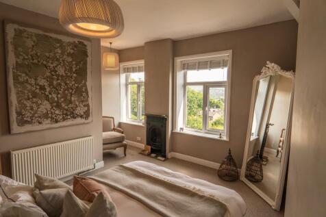 Spacious and Serene Master Bedroom