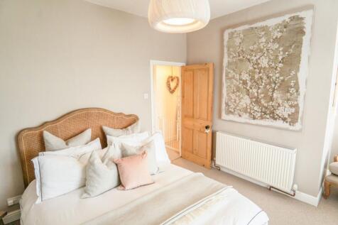 Spacious and Serene Master Bedroom