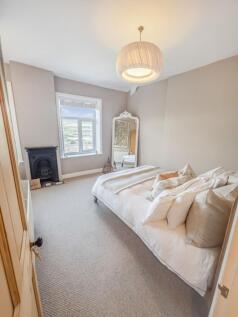 Spacious and Serene Master Bedroom