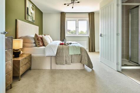 The main bedroom is spacious and overlooks the rear garden