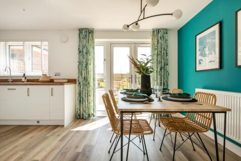 Double doors in the kitchen/dining area open out to the rear garden