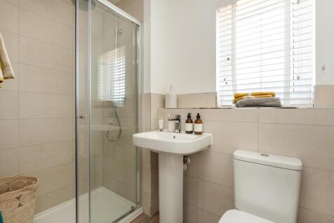 En-suite shower room away from the family