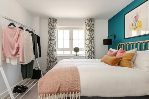 The second bedroom has ample space for storage