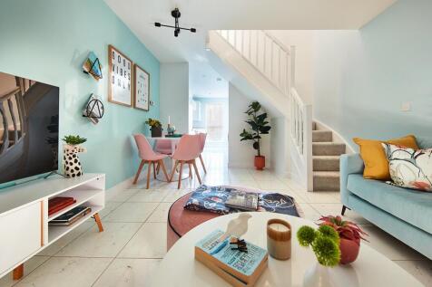 Step through into the spacious living room, with doors to the garden