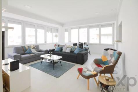 A bright, modern living room 35m2 with large windo