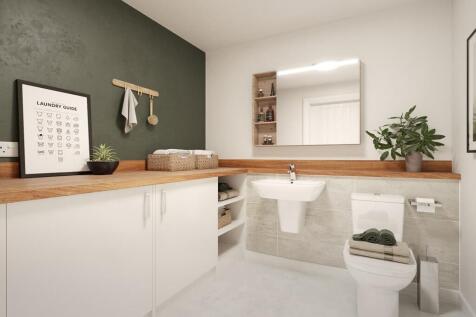 A downstairs toilet and utility room adds convenience