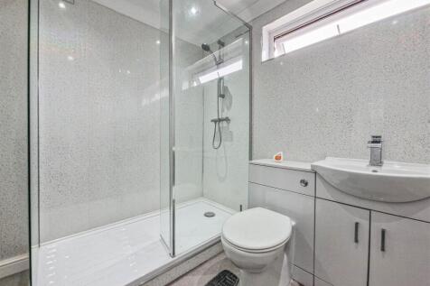 Shower room (with utility cupboard)