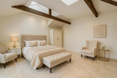Spacious Loft Bedroom with Elegant Touches.jpg