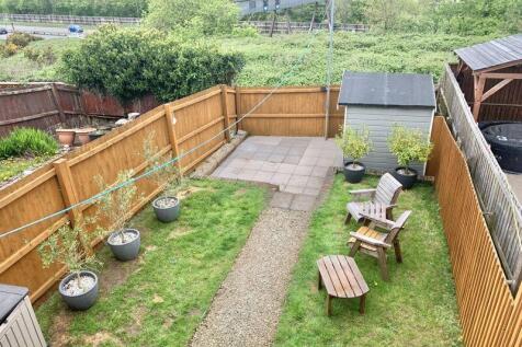 View of the rear garden from the fami...