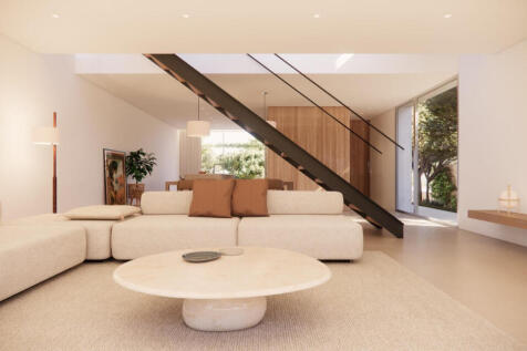 Living room with view into the kitschen