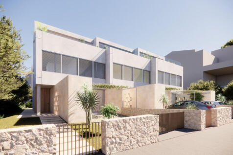 Front view of the house with other two terraced houses