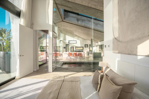 View from the master area towards the indoor pool and kitchen-dining-living room