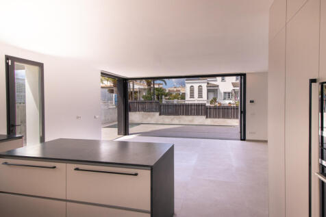 View from the kitchen area to the refreshment pool with terrace