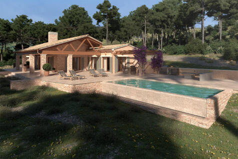 House and pool surrounded by woodland