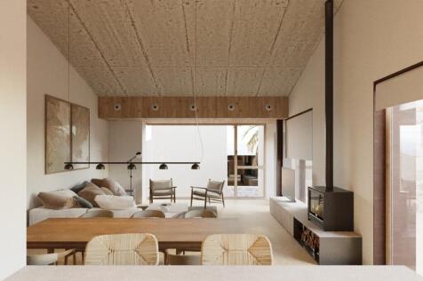 Open and bright living concept with fireplace in the lounge