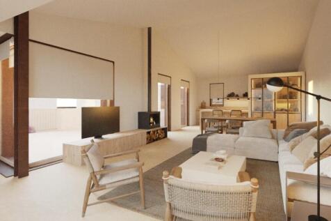 View from the lounge toward the open kitchen and bistro corner