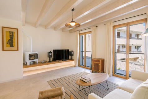 Designer fireplace and entertainment space in the living room on the first floor