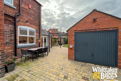 Rear Driveway & Garage