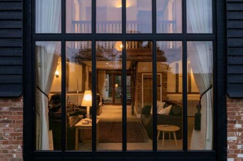 Looking in from outside at dusk