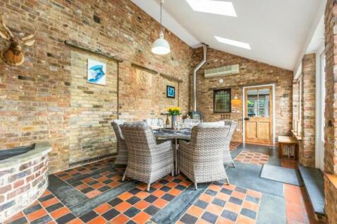 Character-filled brick sunroom