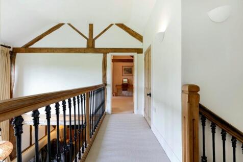 Galleried landing with views over the front garden