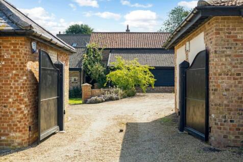 Electric gates entering the Courtyard Garden
