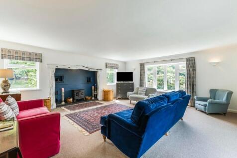 Elegant lounge with wood-burning stove feature