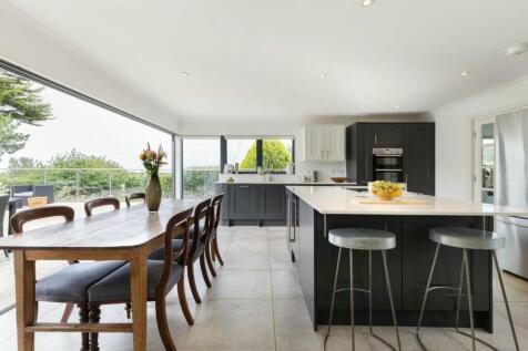 Elegant kitchen with seamless terrace views